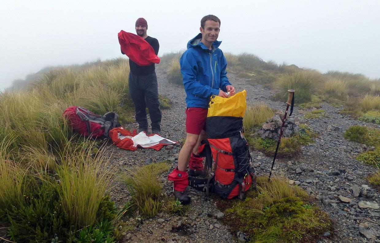 Snack break in the clag on the way up Mitre Peak