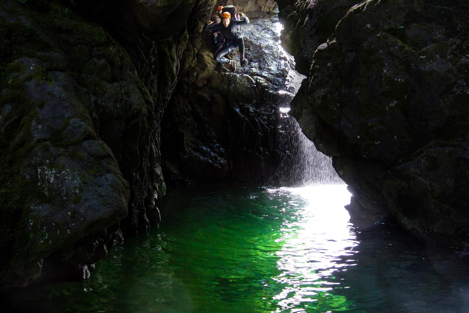Jumping into a pool in the Chamberlain Creek gorge