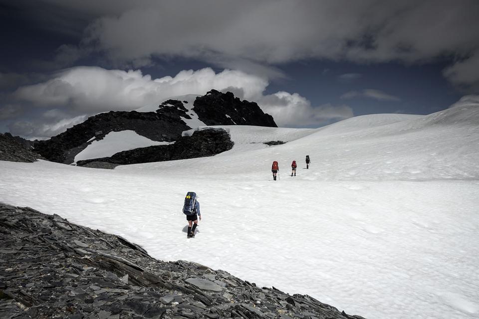 Climbing up the gentle snow slopes of Steadman Brow