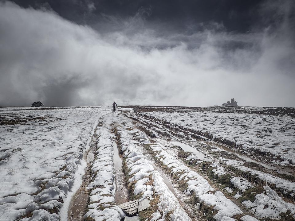 Otago difficult mountain biking through mud, snow and vehicle ruts