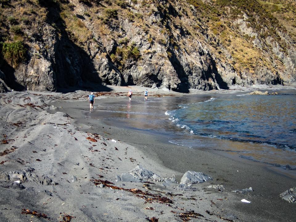 A stretch of sandy beach that may become difficult at high tide