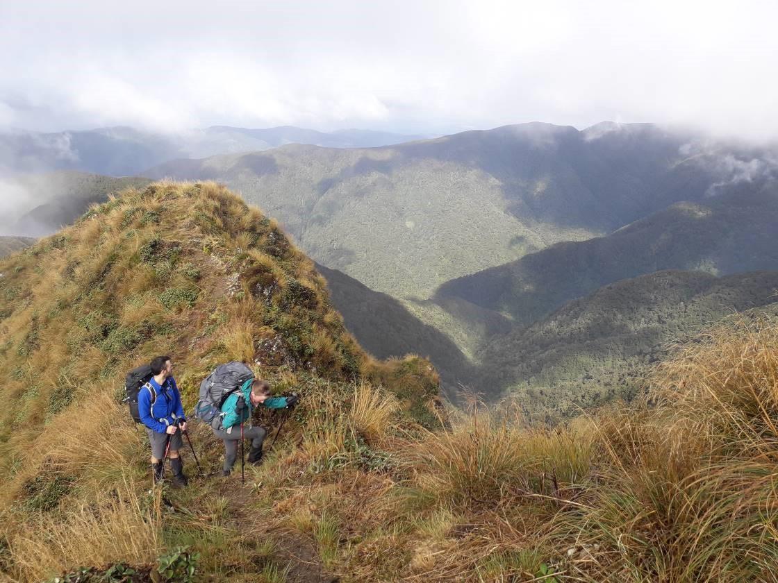Gareth and Shauna look back down the valley and beyond to Cone Saddle