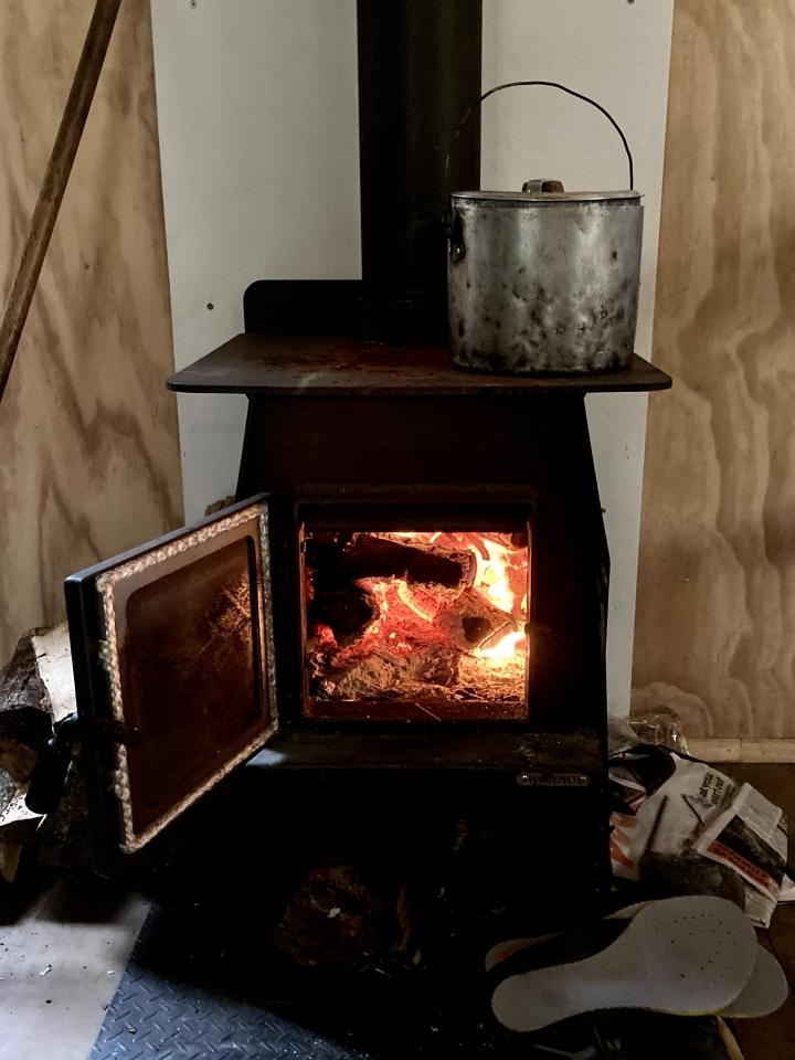 Fire burning in Iron Gate Hut