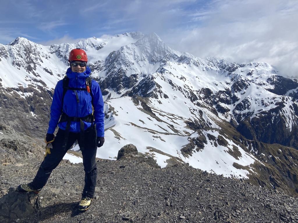 Elisabet on the summit of Avalanche Peak. Mt Rolleston and Rome Ridge slightly obscured behind