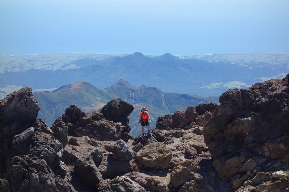 Tramper on top of Mt Taranaki
