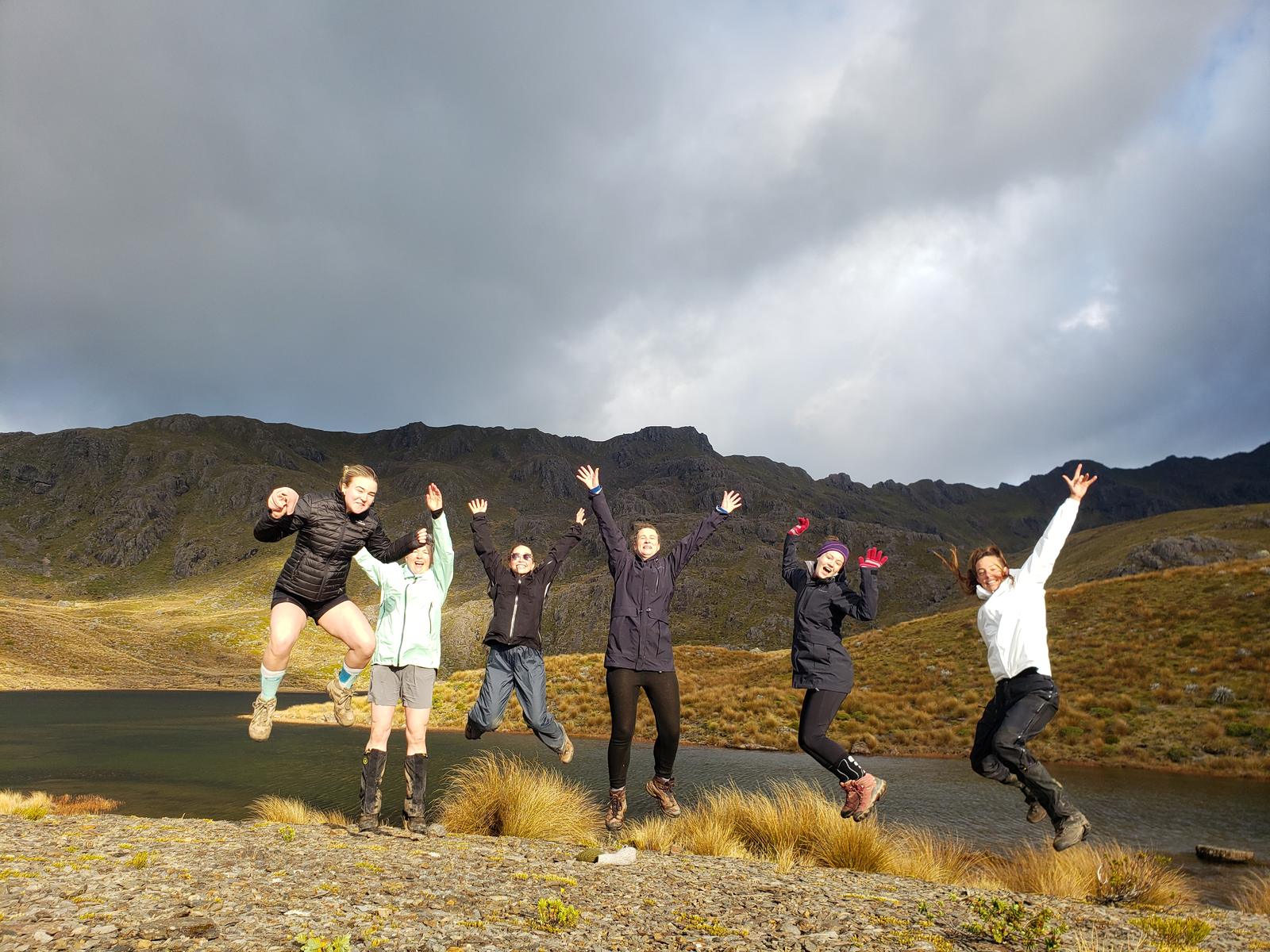 Trampers in front of a lake