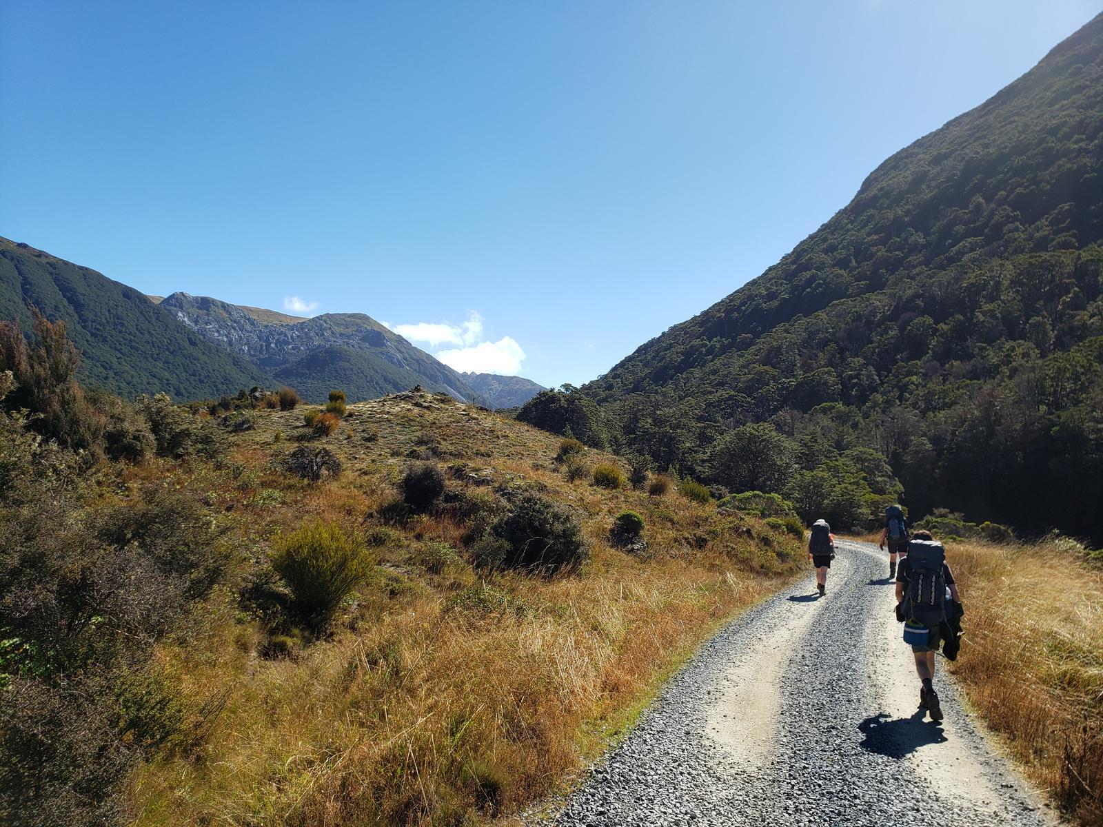 Walking on a gravel road in a valley