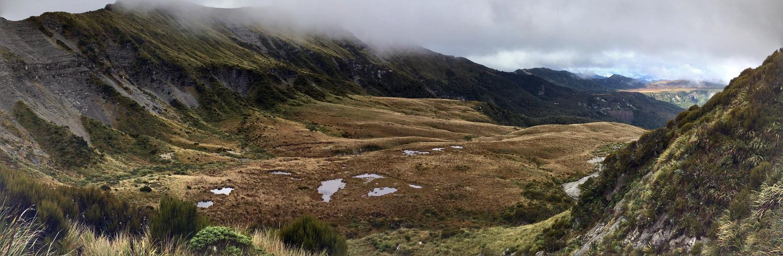 A vista across a mountain cwm with tarns