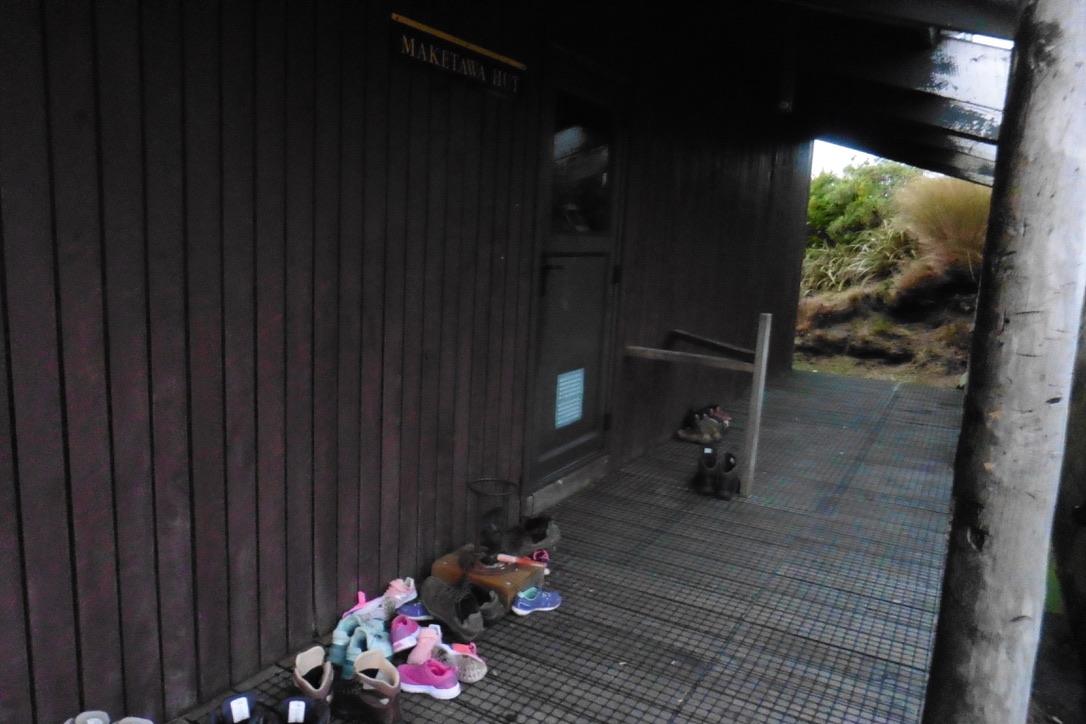 Shoes outside a hut
