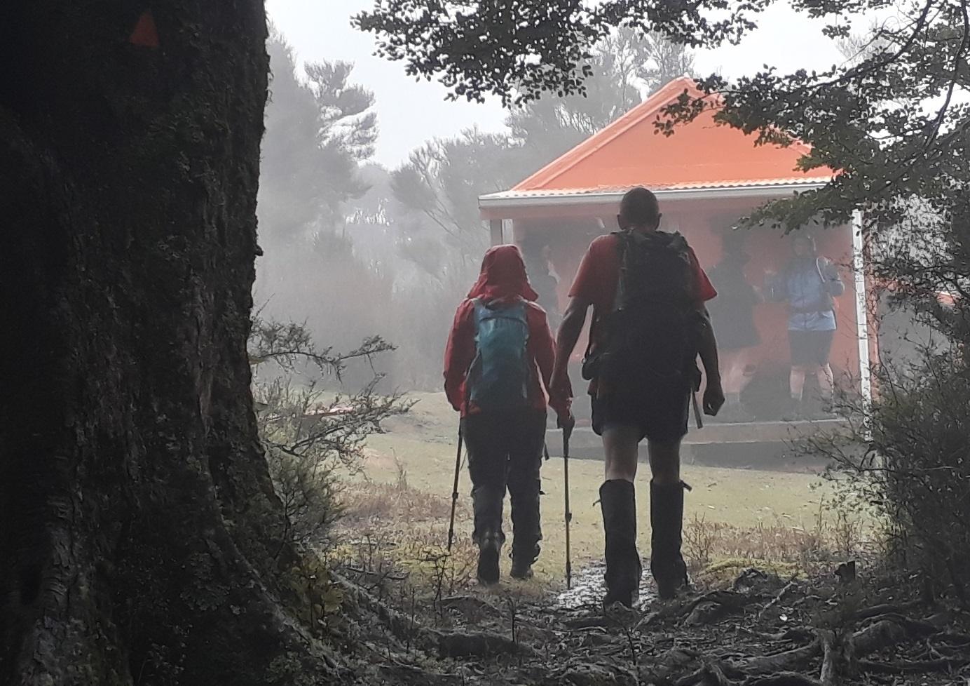 Tramping through mist to hut