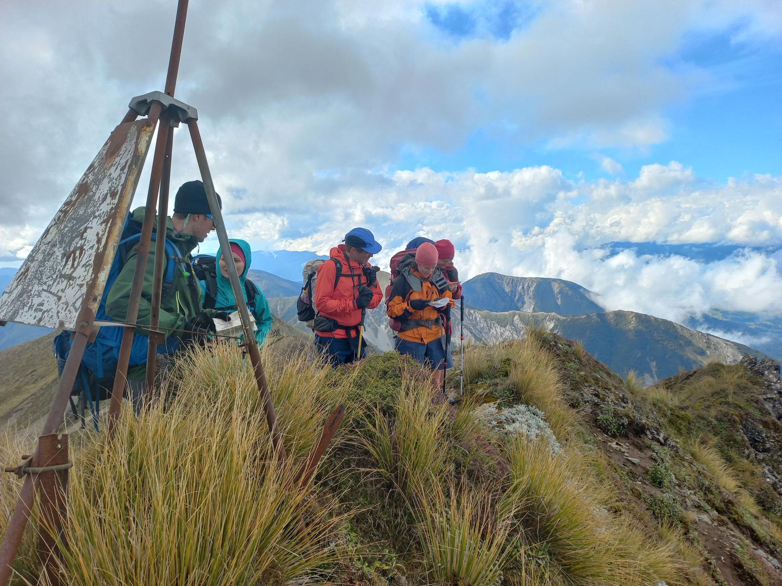 Photo credit: Jamie. Navigation skills in action at the top of Te Atuaoparapara.