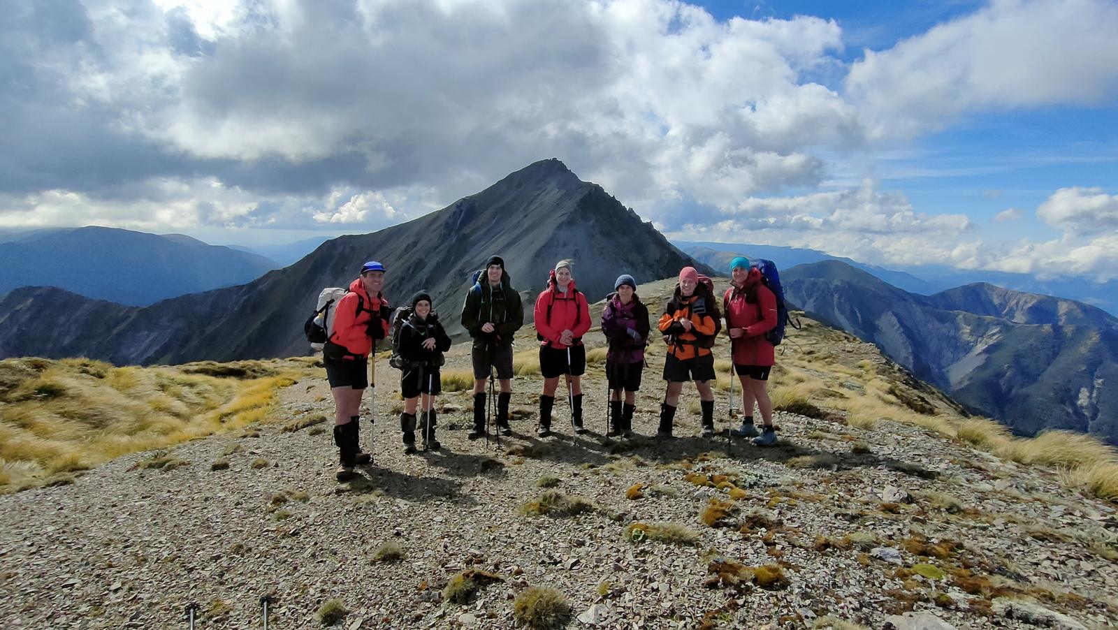 Photo credit: Delia. Team with Te Atuaoparapara behind.