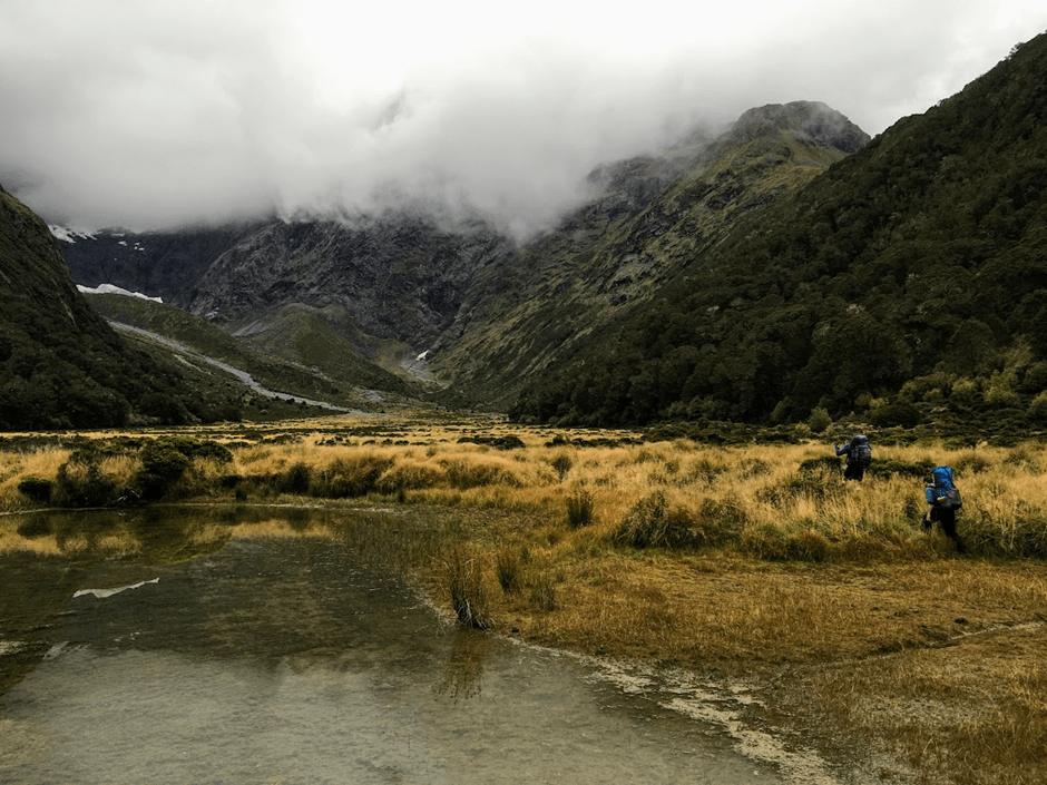 Negotiating the swampy tarn in Mistake Creek.