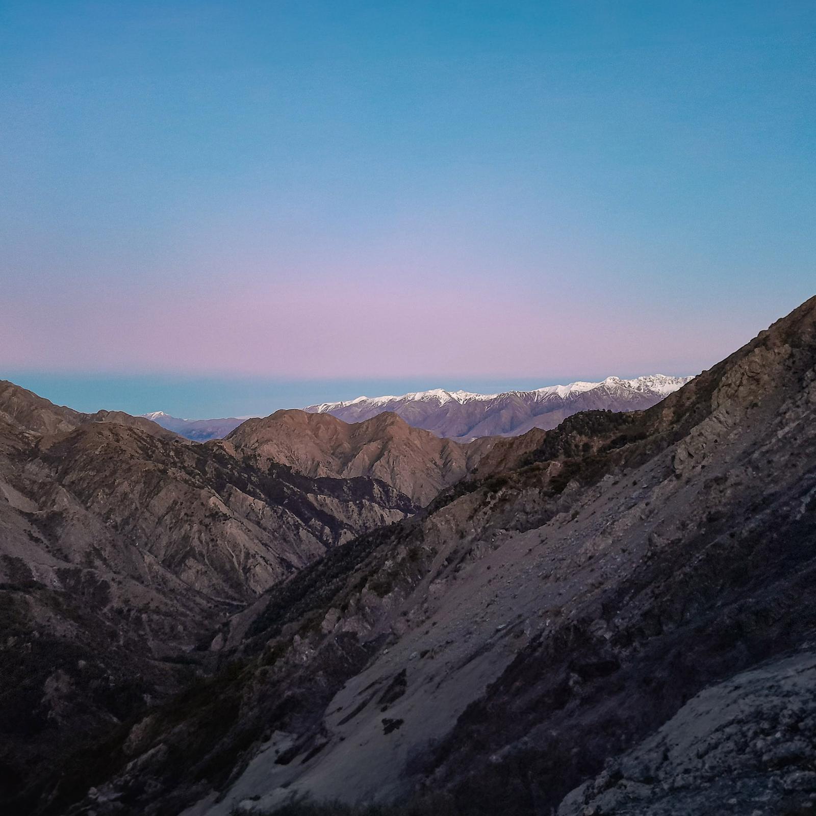 On George Saddle. Inland Kaikoura Range far skyline.