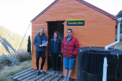 Tony S heroically carried not one but TWO copies of the WTMC journal over the route. Here he proudly displays the copy he deposited at Dundas Hut. Photo credit: Aimee