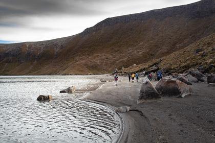 Walking on the sandy beach of Upper Tama Lake
