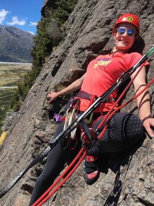 Elisabet finds an interesting rest stance during our abseil off Red Arete