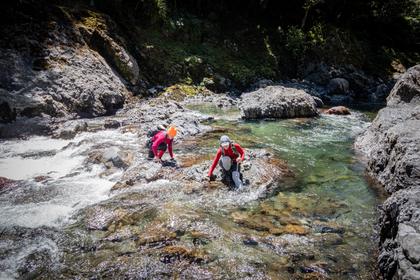 Crossing an awkward rapid in the Waiohine Gorge