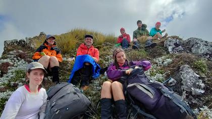 Photo credit: Anne. Lunch just below Te Atuaoparapara.