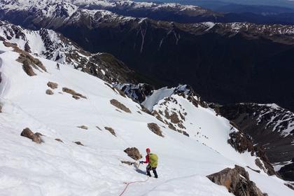Beginning the descent of the South West ridge, sticking with the ropes due to some tricky icy patches