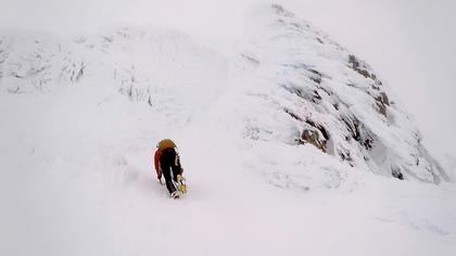 Gareth approaching our chosen ice routes, after the visibility dropped