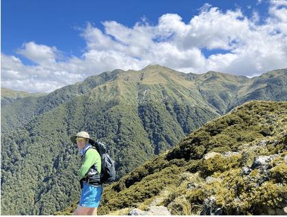 Richard enjoying the view of North King from the treeline on Pukeamoamo