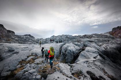 Easy travel over the once glaciated limestone on the way to Sunrise peak