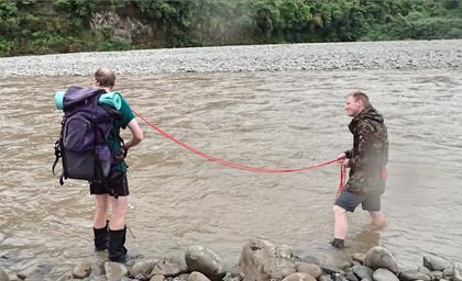Photo credit: Matt. Tony, with pack tied to Pete, prepares to practice releasing from a stuck pack