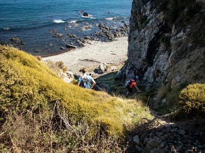 Dropping back to the beach once past the cliffs
