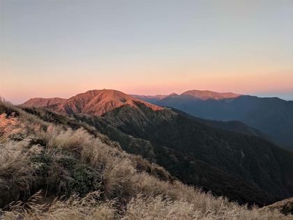 Sunset as seen from just below Maungahuka, looking back towards Wright, Aokaparangi; Holdsworth on the range behind
