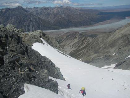 Nick H and Elisabet down climbing the snow slopes back to meet the rocky ridgeline (credit Henry)