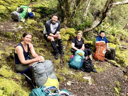 Trampers resting on the Iron Gate Hut Track