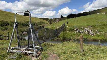 Crossing the farmland to approach Zekes Hut