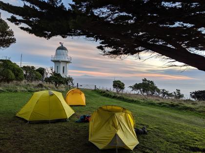 Tents next to Baring Head Lighthouse