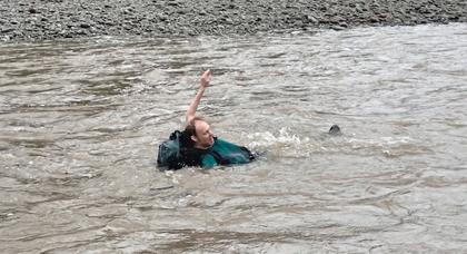 Photo credit: Matt. Tony practices making his way to the river bank pack-floating.