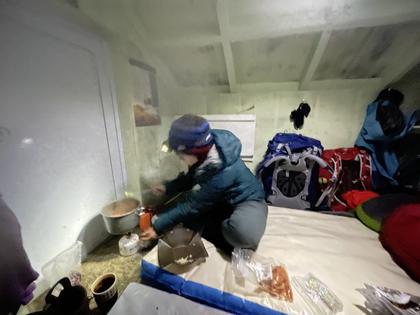 Photo: Cooking dinner at Winchcombe Biv (Photo credit: Emily)