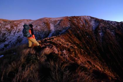 Zuzana looks up the thin ridge from Longview up onto Otumore