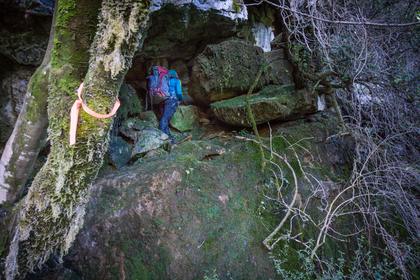 Megan starting along the magic ledge through the Bulmer Bluffs