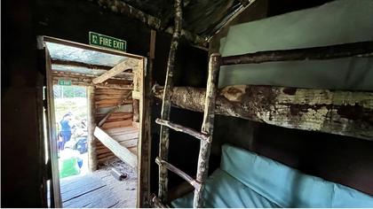 The inside of the historic Chaffey Hut, complete with bespoke furniture