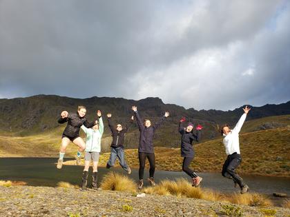 Trampers in front of a lake