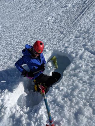 Elisabet digging a tunnel in the snow on Mt Ruapehu