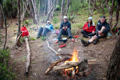 Left to right Kate, Illona Megan, and Tony. Well feed, and happy no more bush-bashing. Although we were nearly flattened by a very large and angry sea lion that crashed through our camp the next morning as we had unknowingly camped on its haul-out track