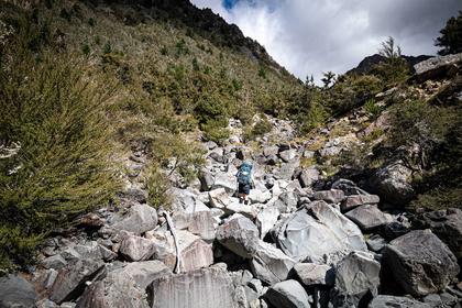 A dry, boulder-filled creek bed