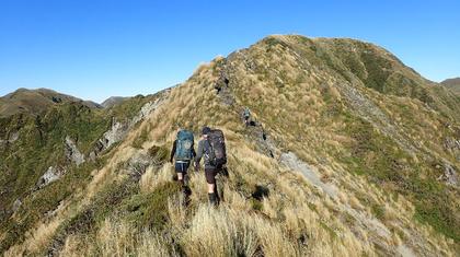 Enjoying a perfect day on the Tararua tops. Photo credit: David