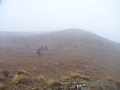 Wandering across Cone Ridge in the clag. Photo credit: Sarah.