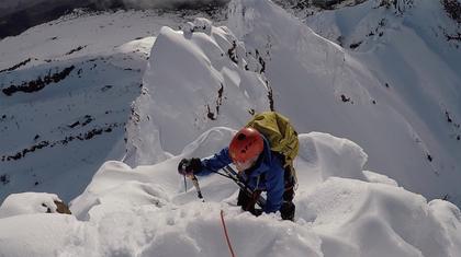 Elisabet approaches the summit of First Pinnacle, where a small cat walk leads to safe ground and the anchor