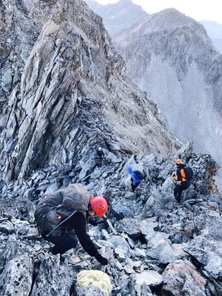 Working our way along the summit ridge. (Photo credit: Caryl).
