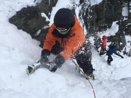 Nick approaches the belay station of ‘Lovely Gulley’ on a fixed line.