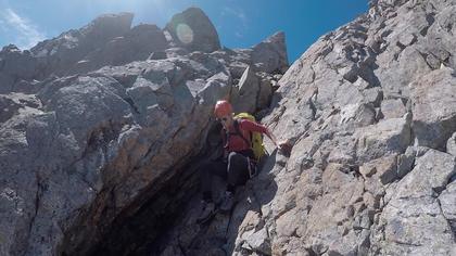 Elisabet carefully down climbs the upper NW Face of Kehu Peak just before we started abseiling
