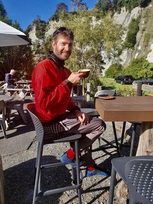 Trip leader AJ enjoys a very civilised start to the day (one of the perks of staying at Awastone). Credit: Aimee